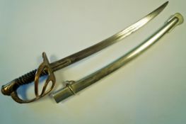 A 20th century letter opener modelled as a sword, the blade impressed H.
