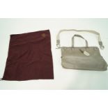 A Mulberry grey leather handbag complete with canvas detachable strap and protection bag.