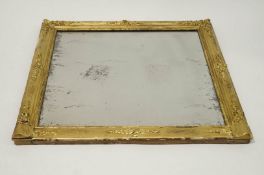 A 19th Century over mantel mirror with wood and gesso moulded frame, later gold painted,