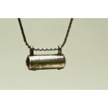 A silver necklace with pill holder,