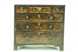 A part 18th Century walnut chest of three short above three long drawers on later bracket feet 89cm