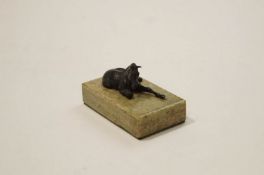 A mid 20th Century bronze model of a lying horse on a rectangular marble base, 5cm high x 8.