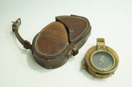 A world war I prismatic compass in leather case
