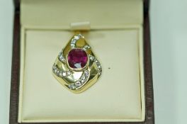 A ruby and diamond pendant, stamped '585' and oriental character marks,