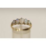 A five stone opal 9 carat gold ring, finger size P, 2.