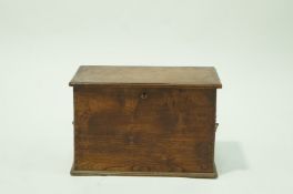 An ash box with two brass handles,