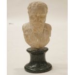 A carved alabaster bust of a gentleman on a 19th Century green marble socle, possibly Roman,