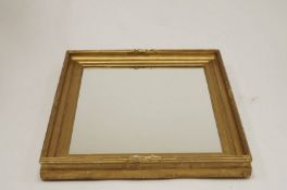 A late 19th century rectangular gilt framed mirror,