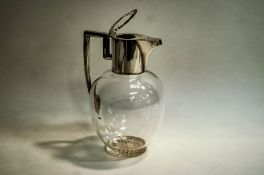 A late Victorian silver and glass mounted claret jug, by J.