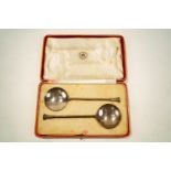 A pair of silver seal top spoons, Carrington & Co Ltd, London 1926, 86 grams, 15.