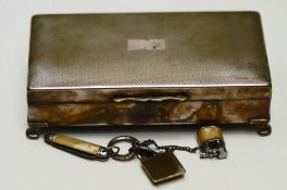 A plated cigarette box; a miniature cigarette lighter stamped Jaguar,