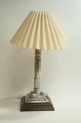 A Silver column candlestick converted to a table lamp
