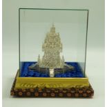 A white metal filigree model of a temple, unmarked, 15 cm high,