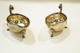 A pair of silver sauce boats, by Edward Barnard & Sons, London 1903, with gadrooned rims,