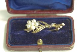 A cultured pearl and diamond flower spray brooch, 3.