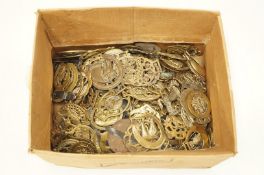 A large collection of horse brasses,