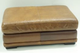 A rectangular leather covered footstool,