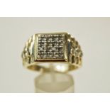 A 16 stone diamond 9 carat gold men's diamond ring,the brilliant cuts totalling approximately 0.