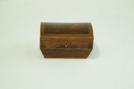 An early Victorian Rosewood domed top sewing box, 14.5cm high x 24cm long x 19.5cm wide.