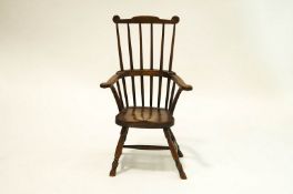 A 19th Century ash and elm Windsor chair with stick back, solid seat & turned legs,