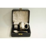 A cased silver christening set, by E Viner, Sheffield 1953, comprising a mug,