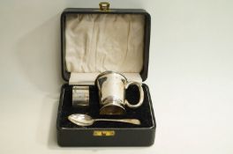 A cased silver christening set, by E Viner, Sheffield 1953, comprising a mug,