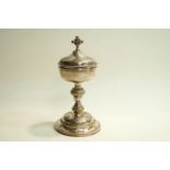 A French Ciborium and cover, with control marks, flat chased with fruiting vine and other flora,