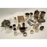 A collection of miscellaneous plated items to include a bi-fold photograph frame, two hip flasks,