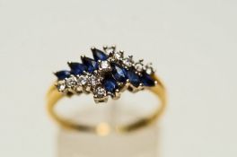 A sapphire and diamond 18 carat gold cluster dress ring, the eight marquise cuts,
