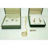 A collection of gold stone set jewellery, comprising; diamond cluster pendant on a chain,
