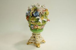 A 19th Century Bloor Derby vase of encrusted flowers on a pierced waisted rectangular base on