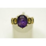 A single stone amethyst ring, stamped '333', probably German, finger size K,