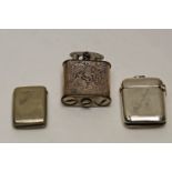 Two metal vesta cases;