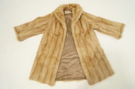 A Ladies Fur coat, with stitched label 'Maxwell Croft London, Bath'.