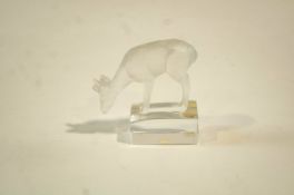 A Lalique glass model of a deer, on a rectangular base, 'Lalique France' etched to the base, 8.