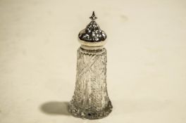 A silver topped sugar caster