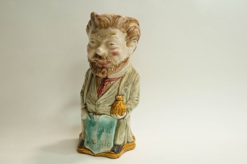 A Majolica pitcher, by Frie Onnaing, depicting French Politician Camille Pelliaon,