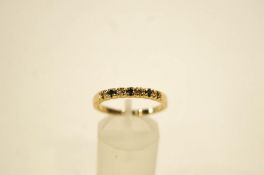A gold plated stone set half hoop ring,