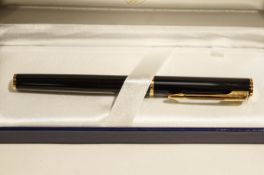 A boxed Waterman fountain pen,