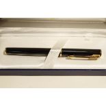 A boxed Waterman fountain pen,