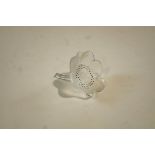 A Lalique ring holder, in the form of a flower, etched 'Lalique France' to the stem, 8.