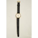 Buren, Grand Prix, a gentleman's 9 ct gold cased round wrist watch, circa 1959,