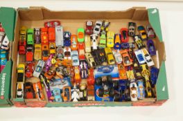 A large collection of hotwheels and matchbox toy cars