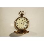 Elgin, a hunter cased pocket watch, the gilded case housing a signed keyless wound 7 jewel movement,