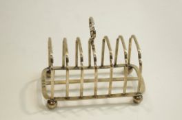 A late Victorian silver six division toast rack, Birmingham 1895, by Plante & Co,