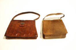 Two vintage leather handbags,