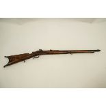 A 19th Century flintlock percussion rifle, steel mounts,