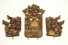 Three gilt wood Chinese mounts,