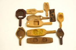 A collection of eleven Chinese/Tibetan sweet or cake moulds,