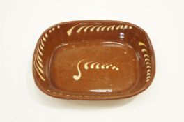 A 19th Century rectangular brown Slipware dish,